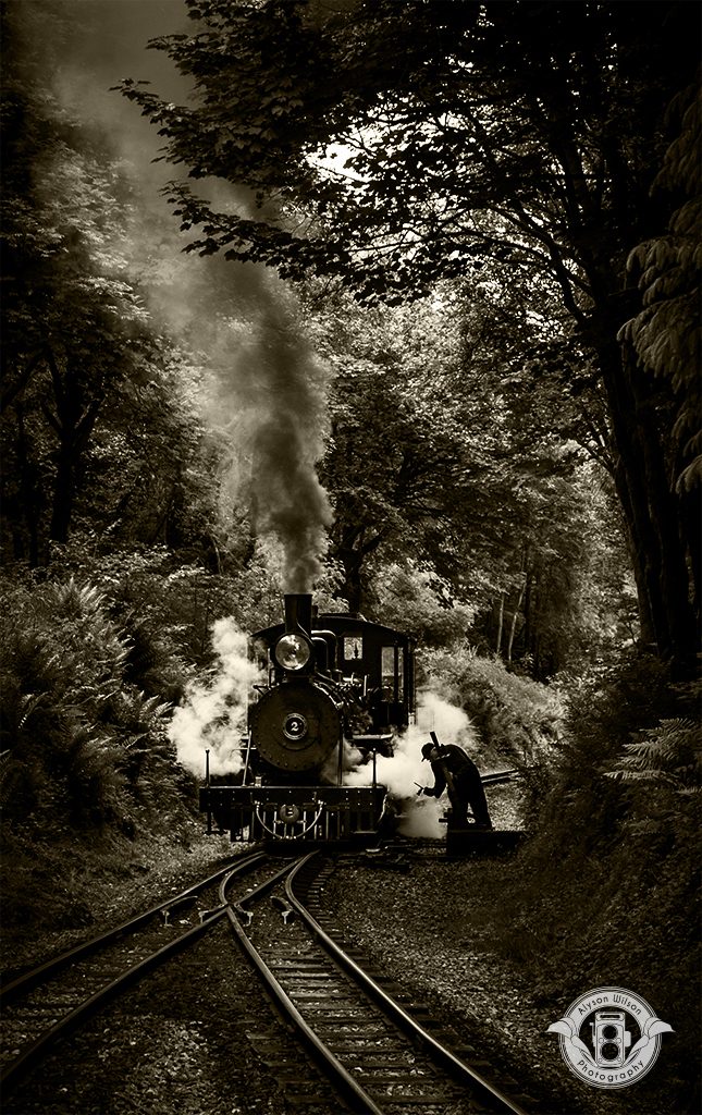 Brecon Beacon Railway train with points man and lots of steam